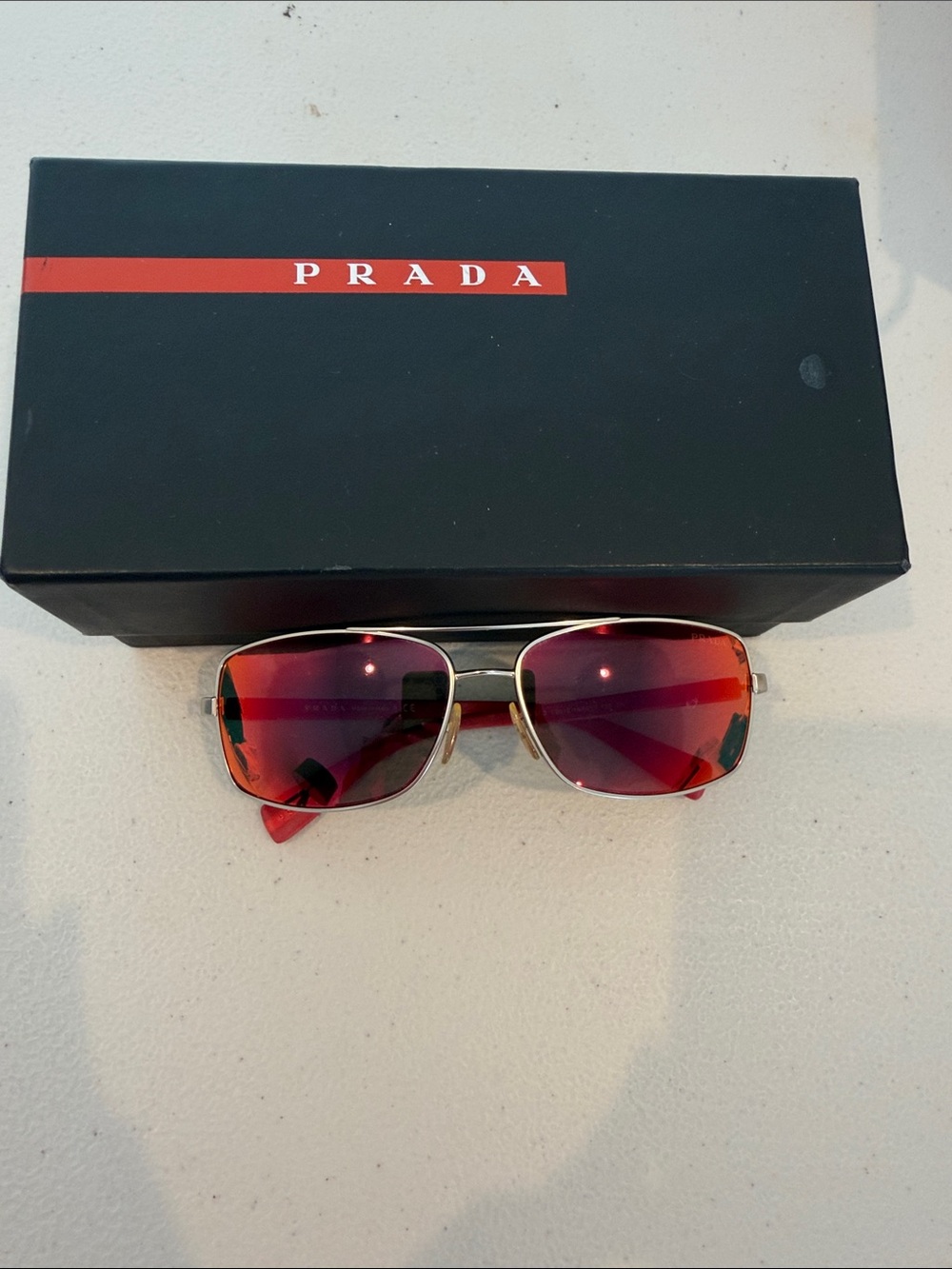 Prada silver Frame Sunglasses with Red-Orange Gradient Lenses